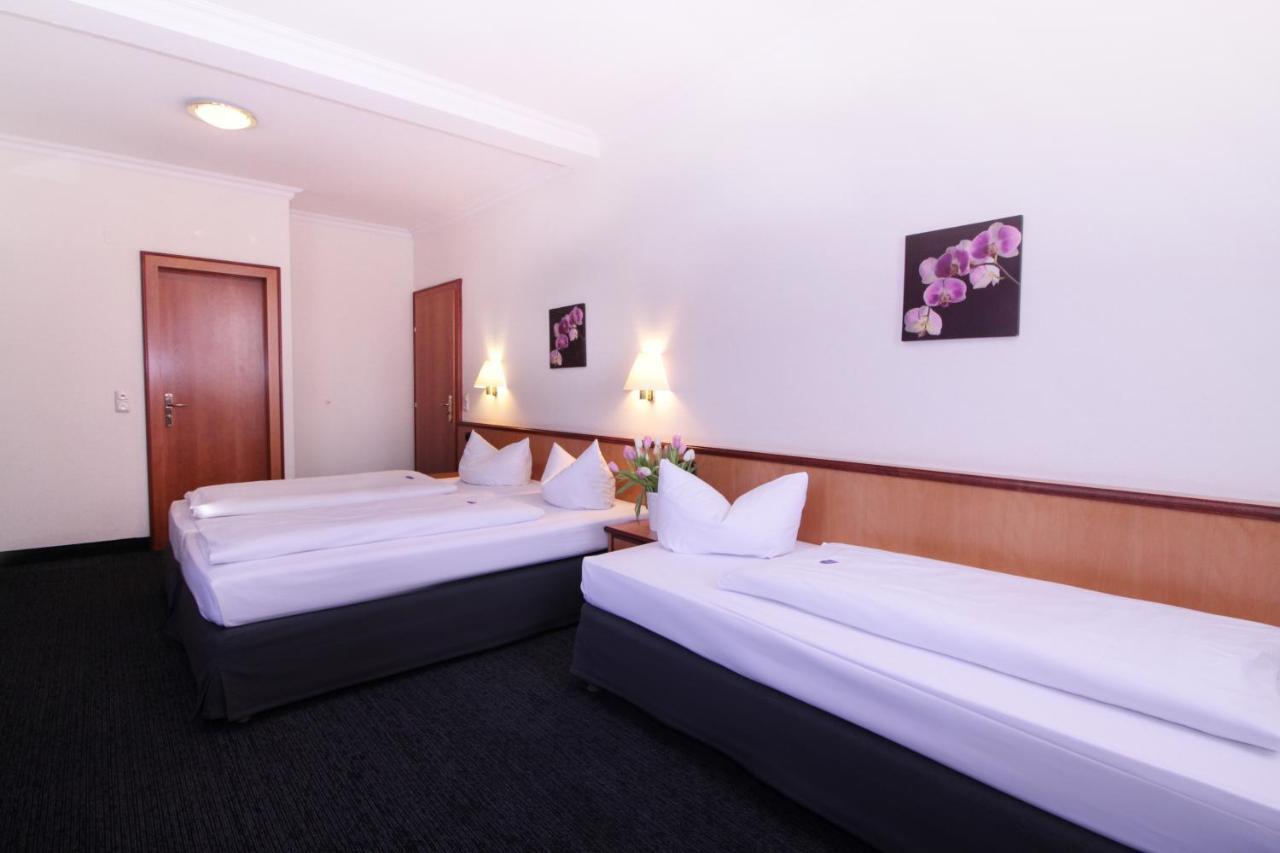 Dreibettzimmer