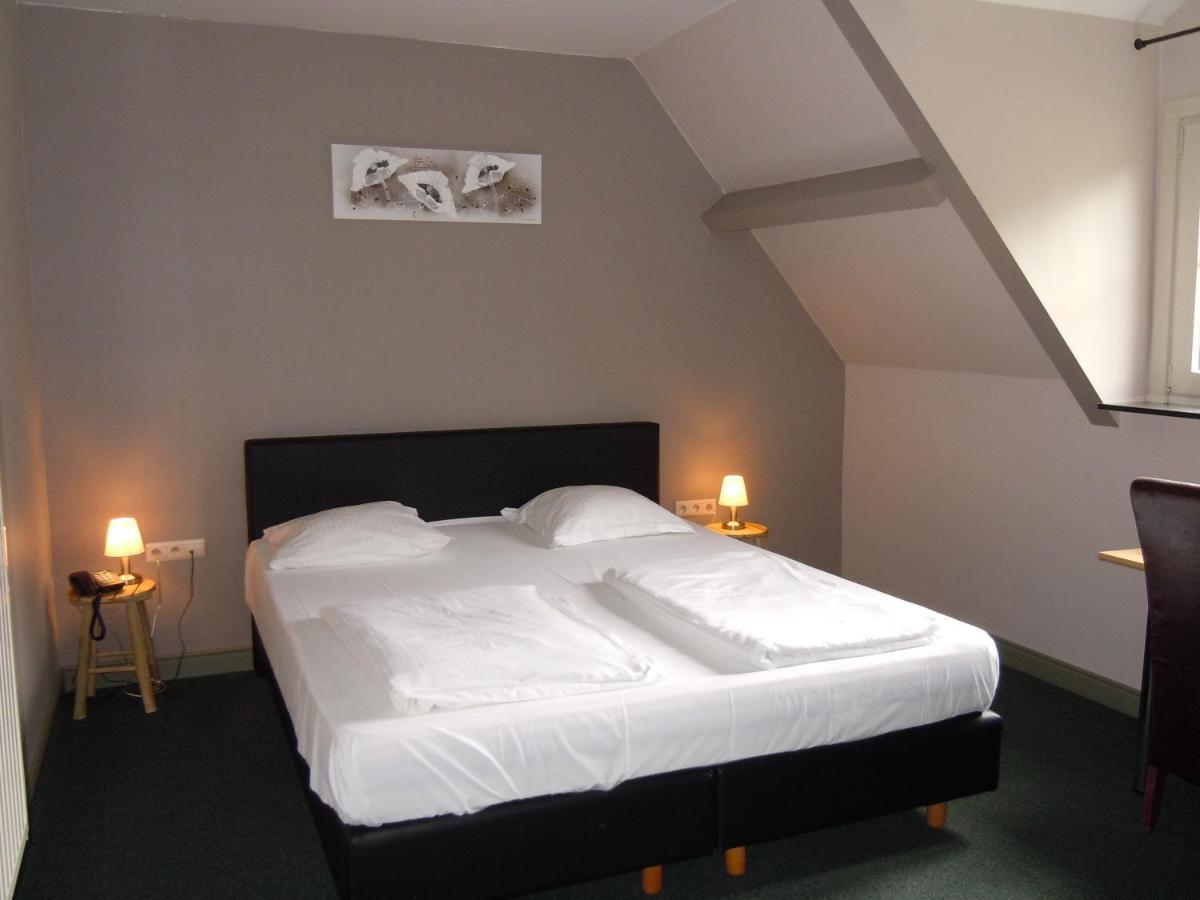 Kamer met Kingsize Bed