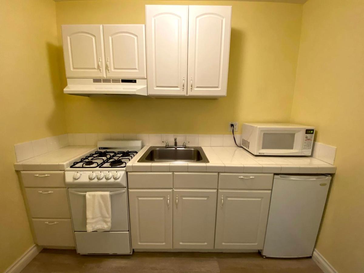 Executive Kamer 2 Queensize Bedden met Keuken