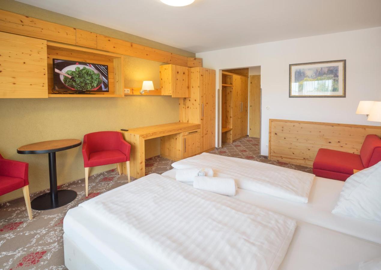 Dreibettzimmer mit Balkon