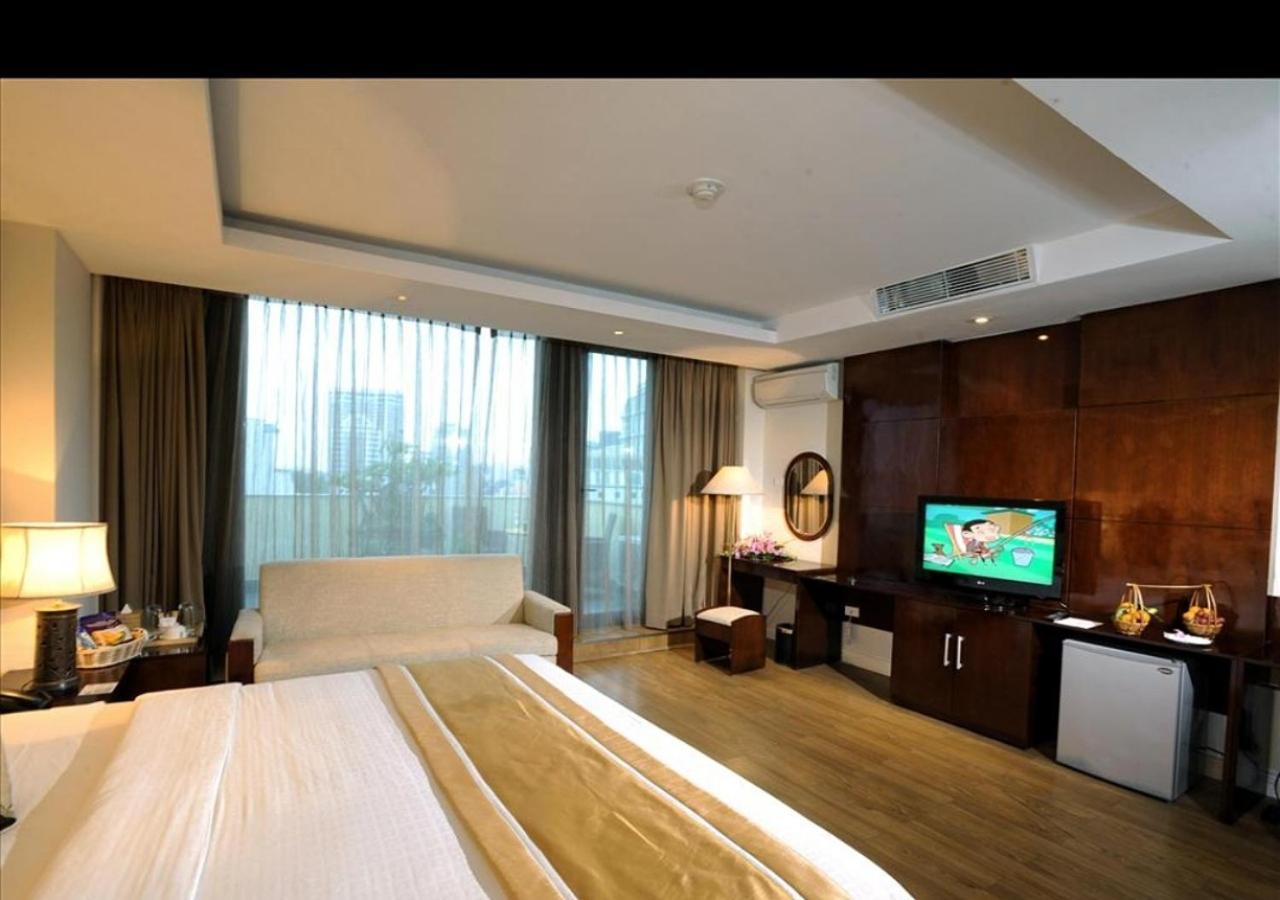 Zimmer mit teilweisem Meerblick und 1 Kingsize-Bett