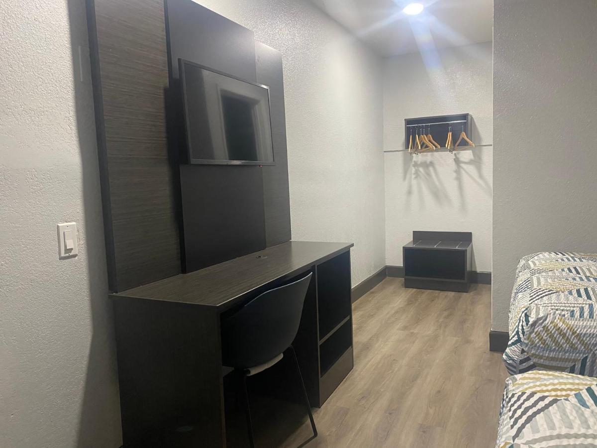 1 King Bed | Mini Fridge