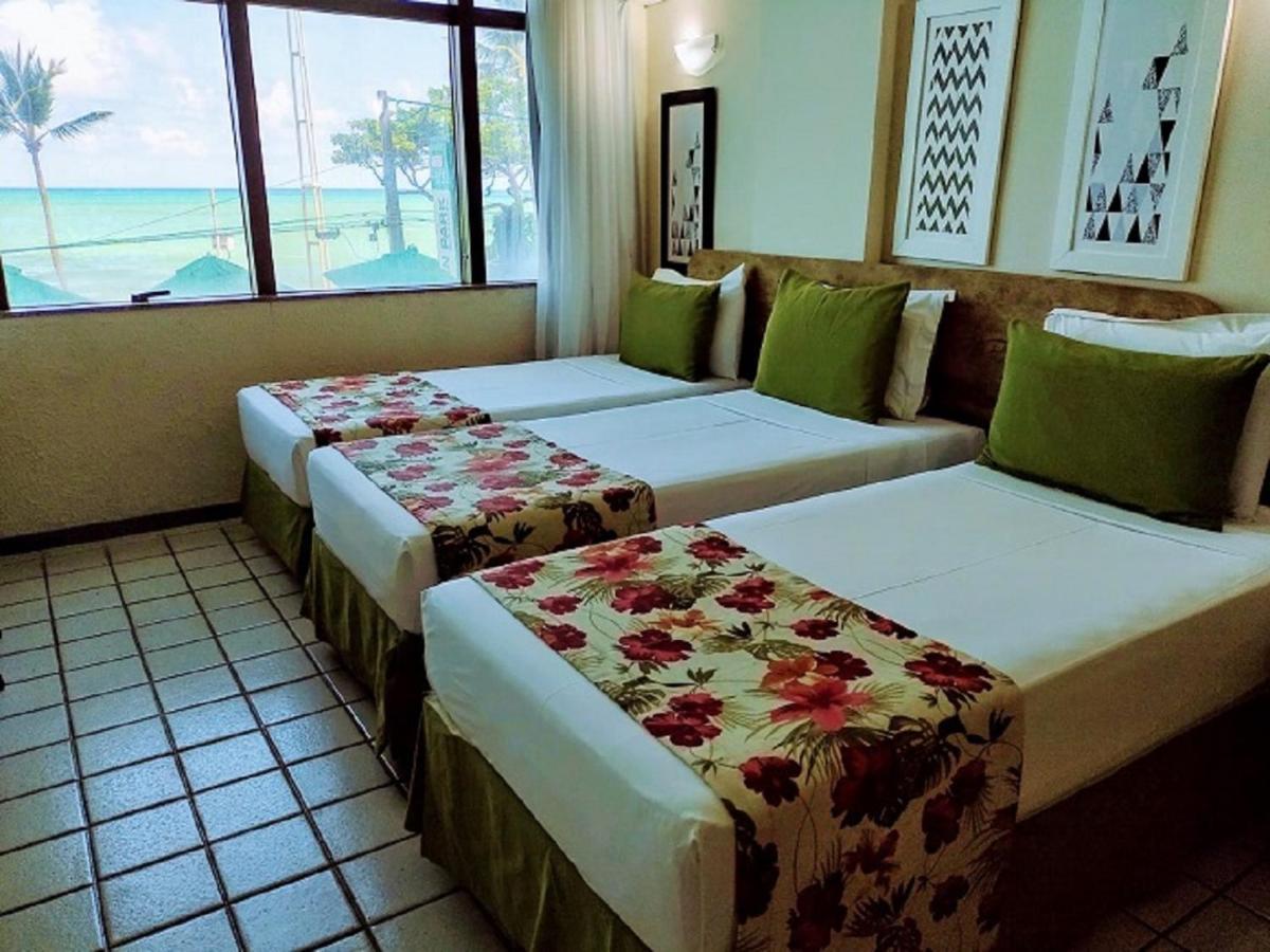 Quarto Triplo com Vista do Mar