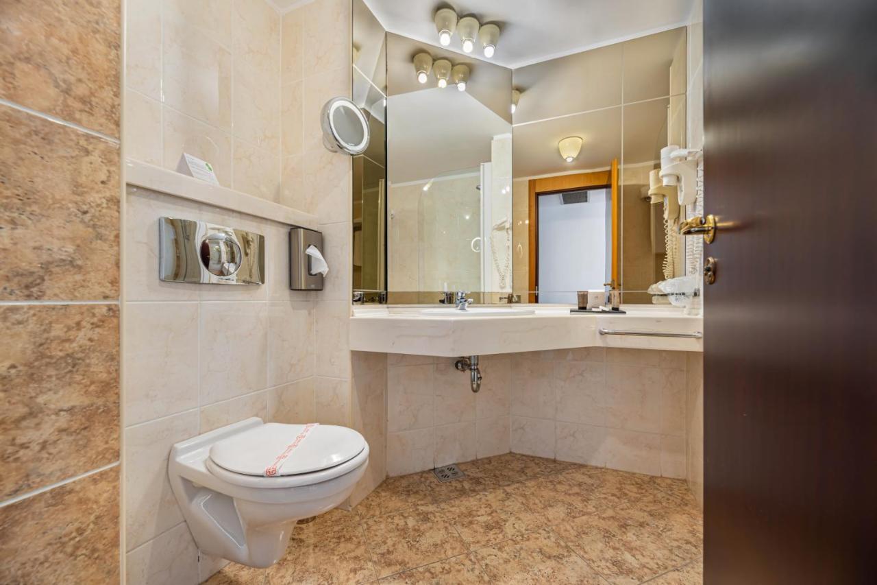 Habitación Executive con cama grande y acceso al spa