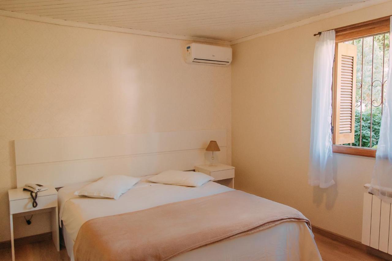 Quarto Deluxe com Cama de Casal ou 2 de Solteiro
