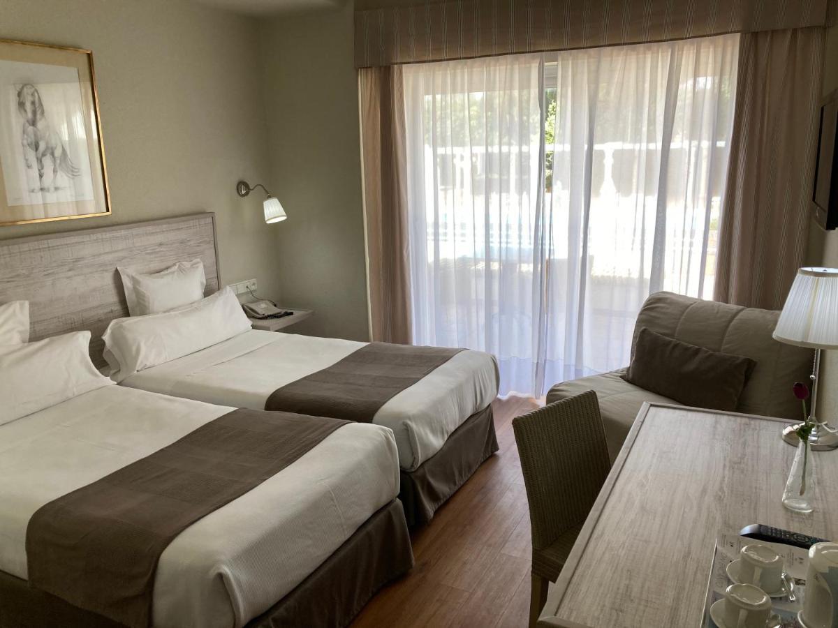 Habitación Doble con cama supletoria - 1 o 2 camas (2 adultos + 1 niño)