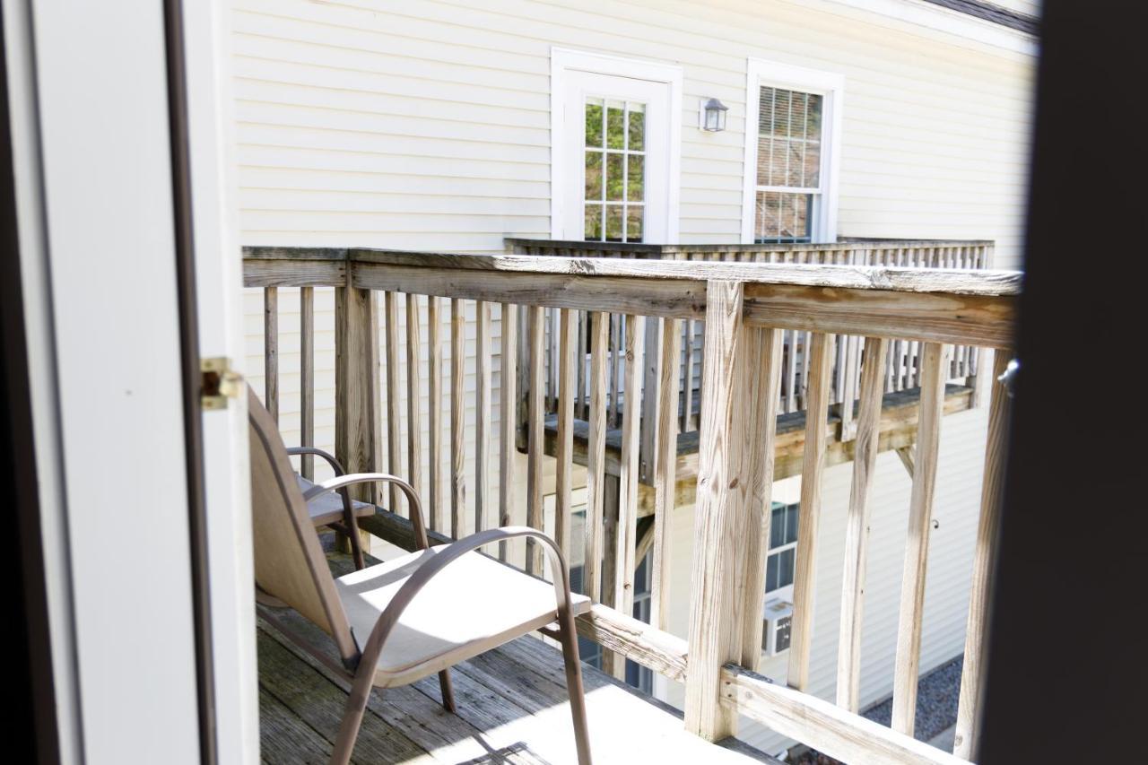 King Wet Bar and Balcony Compass Rose Building