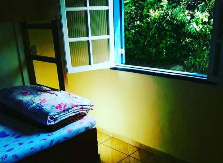 Quarto Triplo com Vista para a Montanha