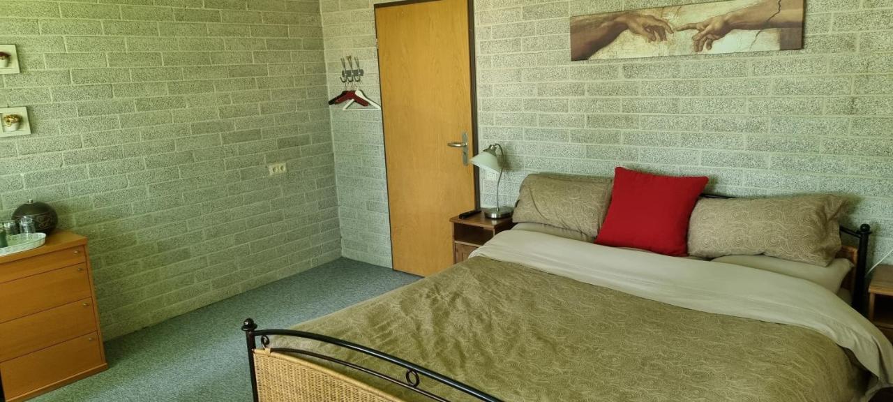 Kamer met Kingsize Bed en Uitzicht op de Tuin