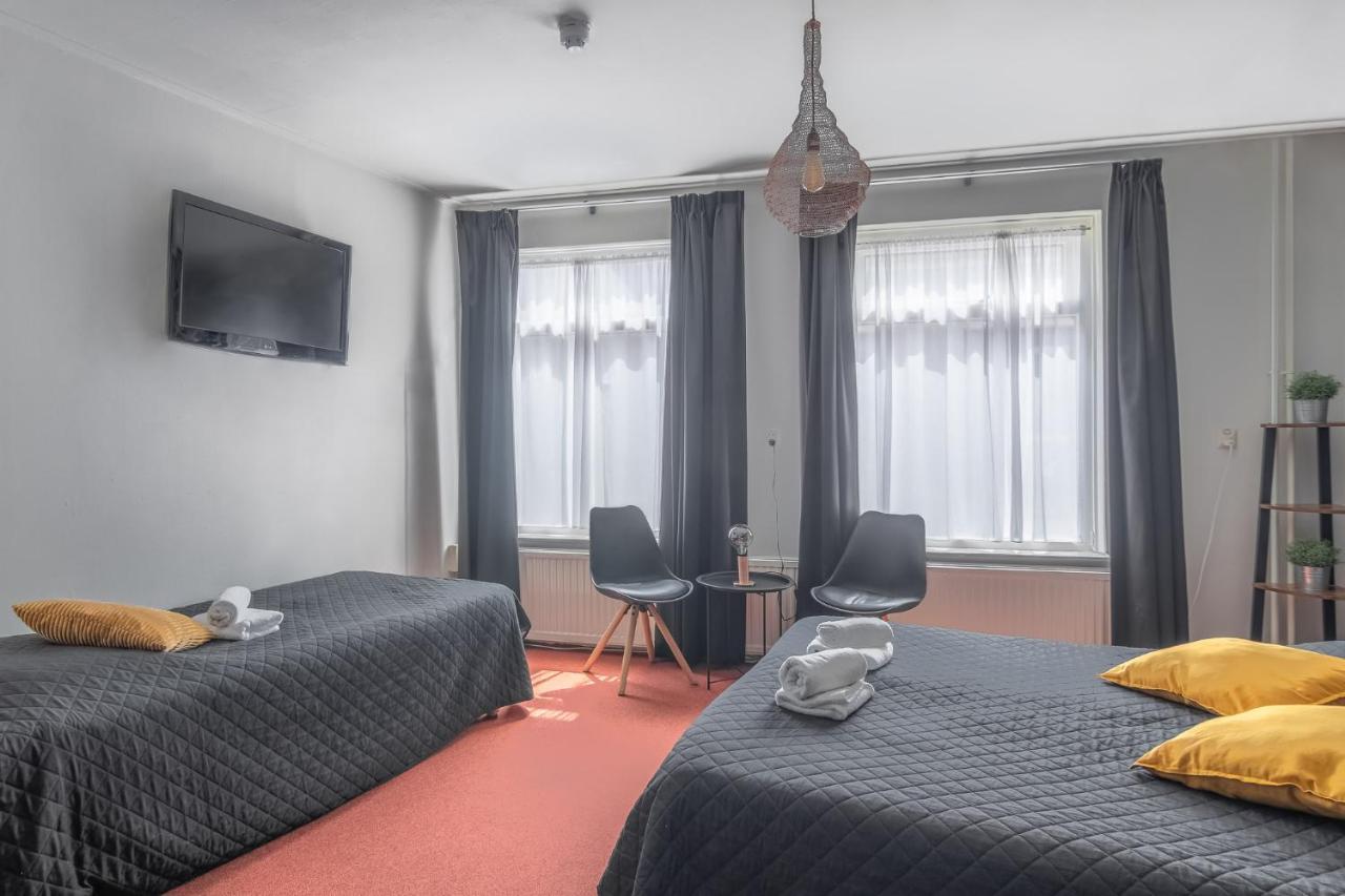 Tweepersoonskamer met 2 Aparte Bedden
