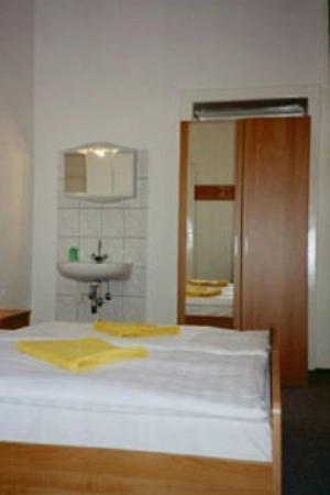 Habitación Triple con baño compartido