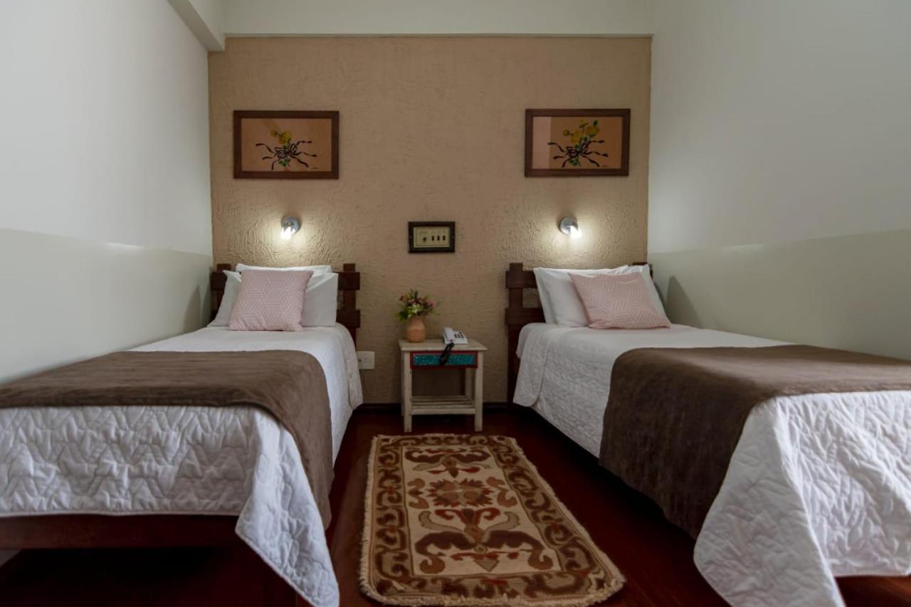 Quarto Duplo