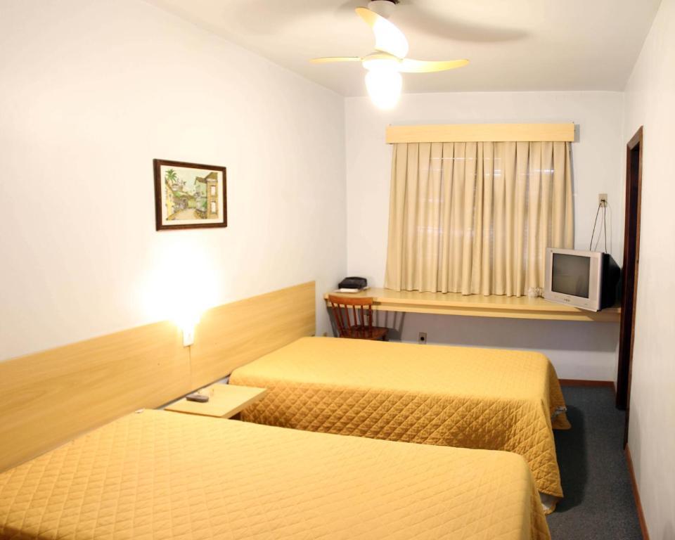 Quarto Luxo com Cama de Casal ou 2 de Solteiro