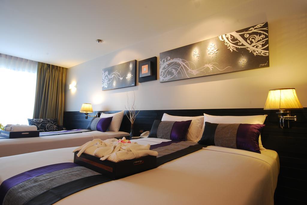 Grand Deluxe Driepersoonskamer