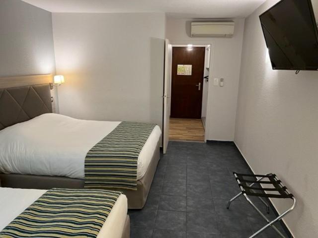Kamer met 2 Kingsize Bedden