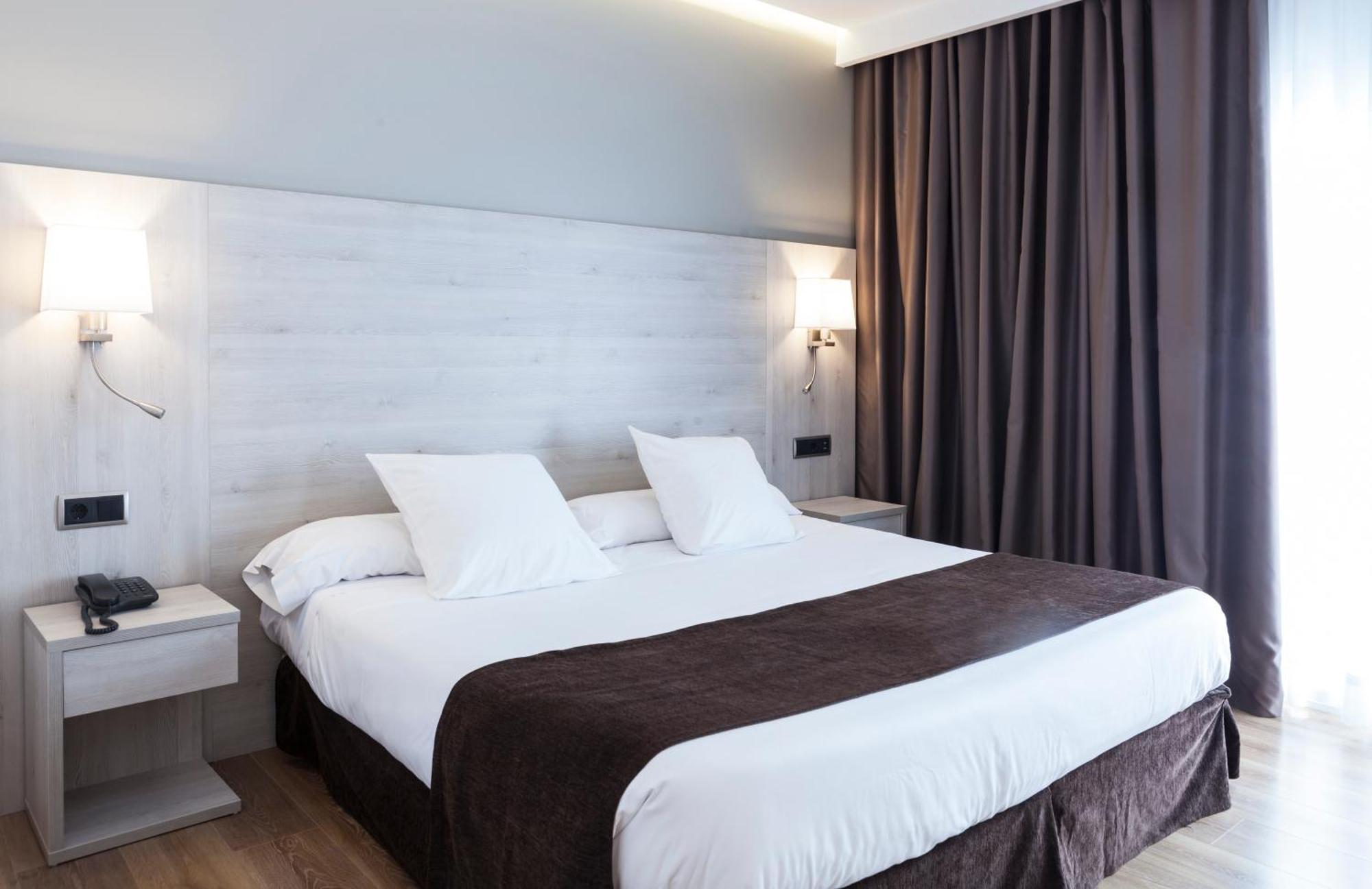 Double Room with Balcony (2 Adults + 1 Child),1207826122:JPEG