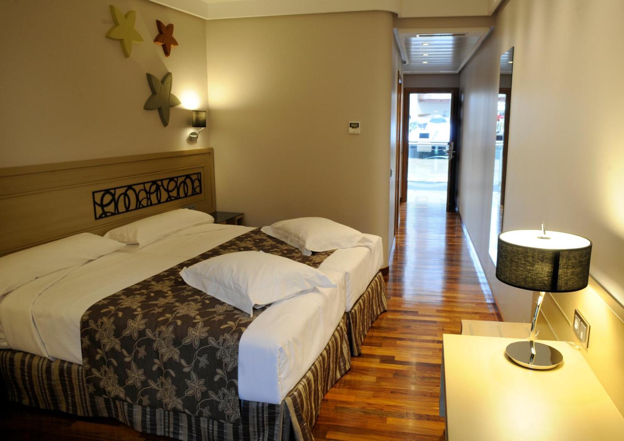 Habitación Doble con cama supletoria (3 adultos) - 2 camas