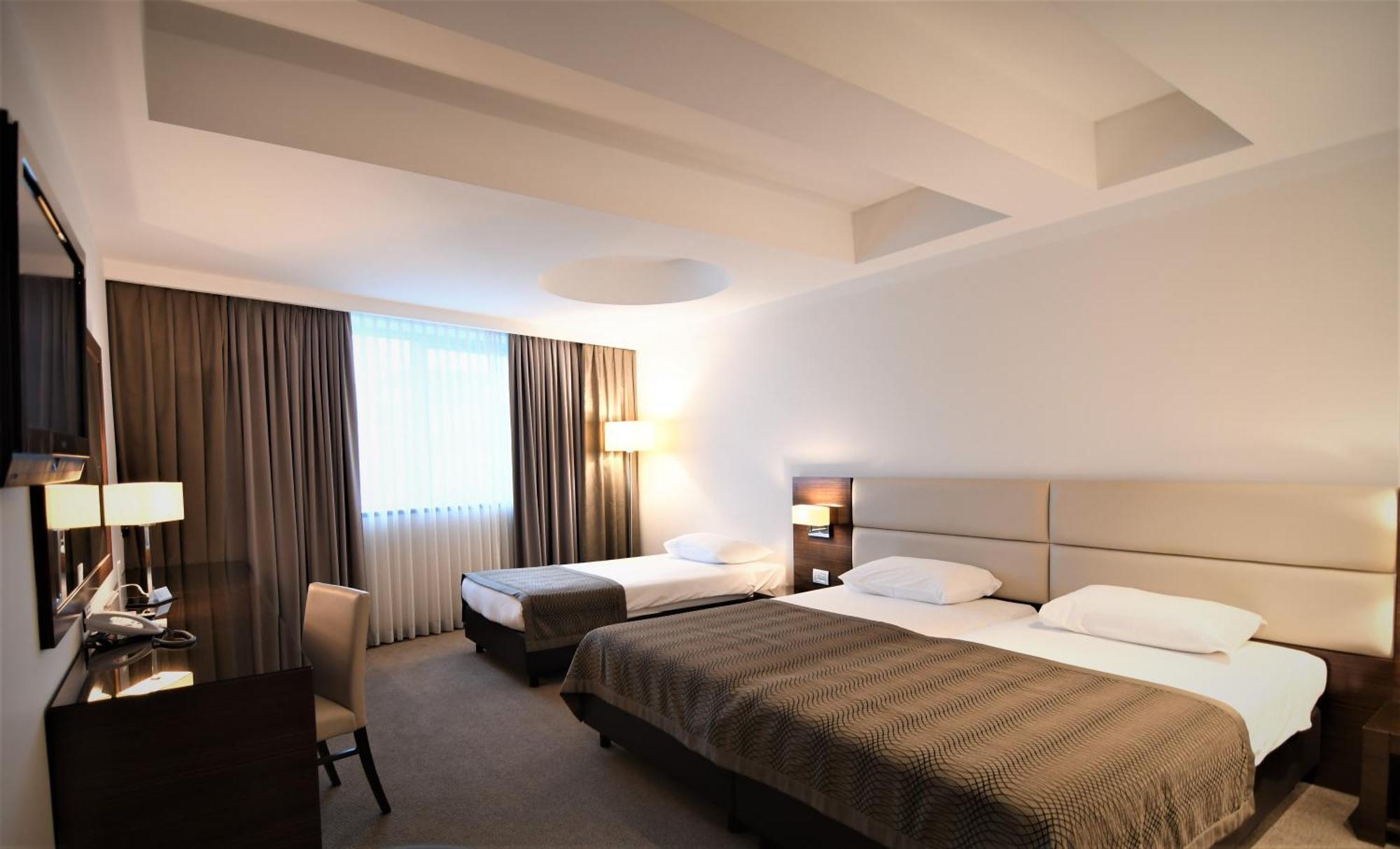 Deluxe Dreibettzimmer
