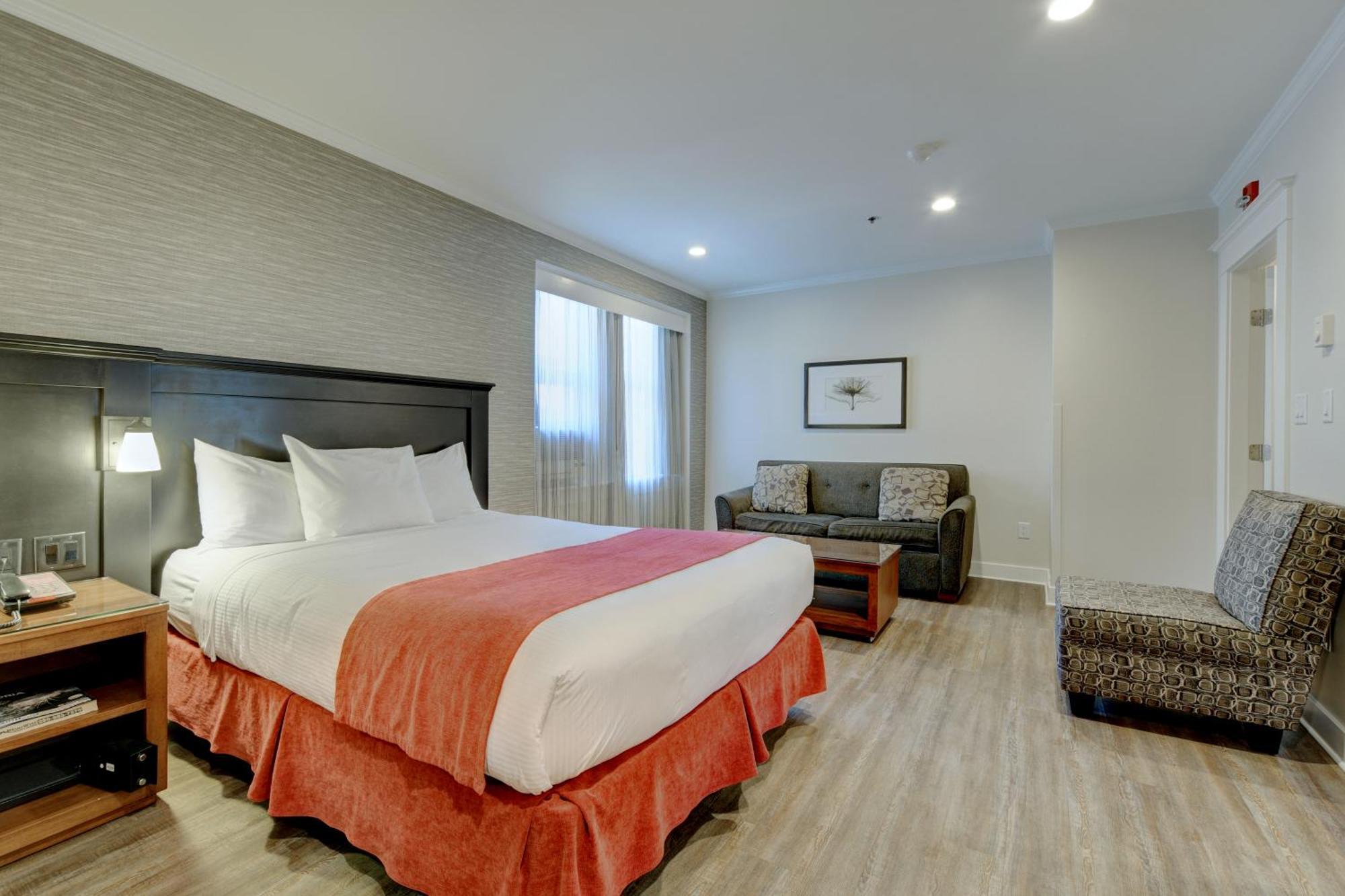 Queen Room with Two Queen and Pullout Sofa