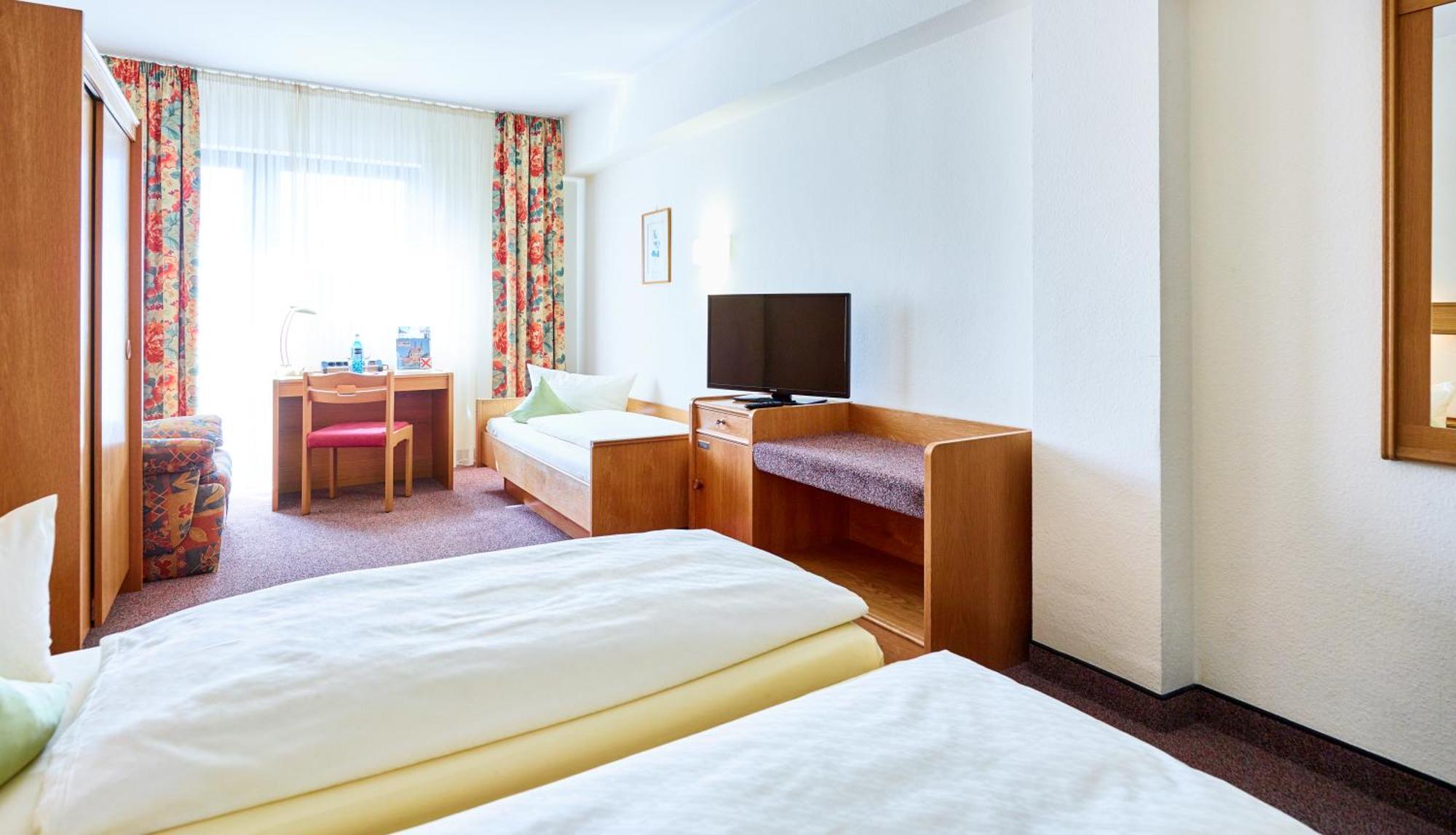 Dreibettzimmer
