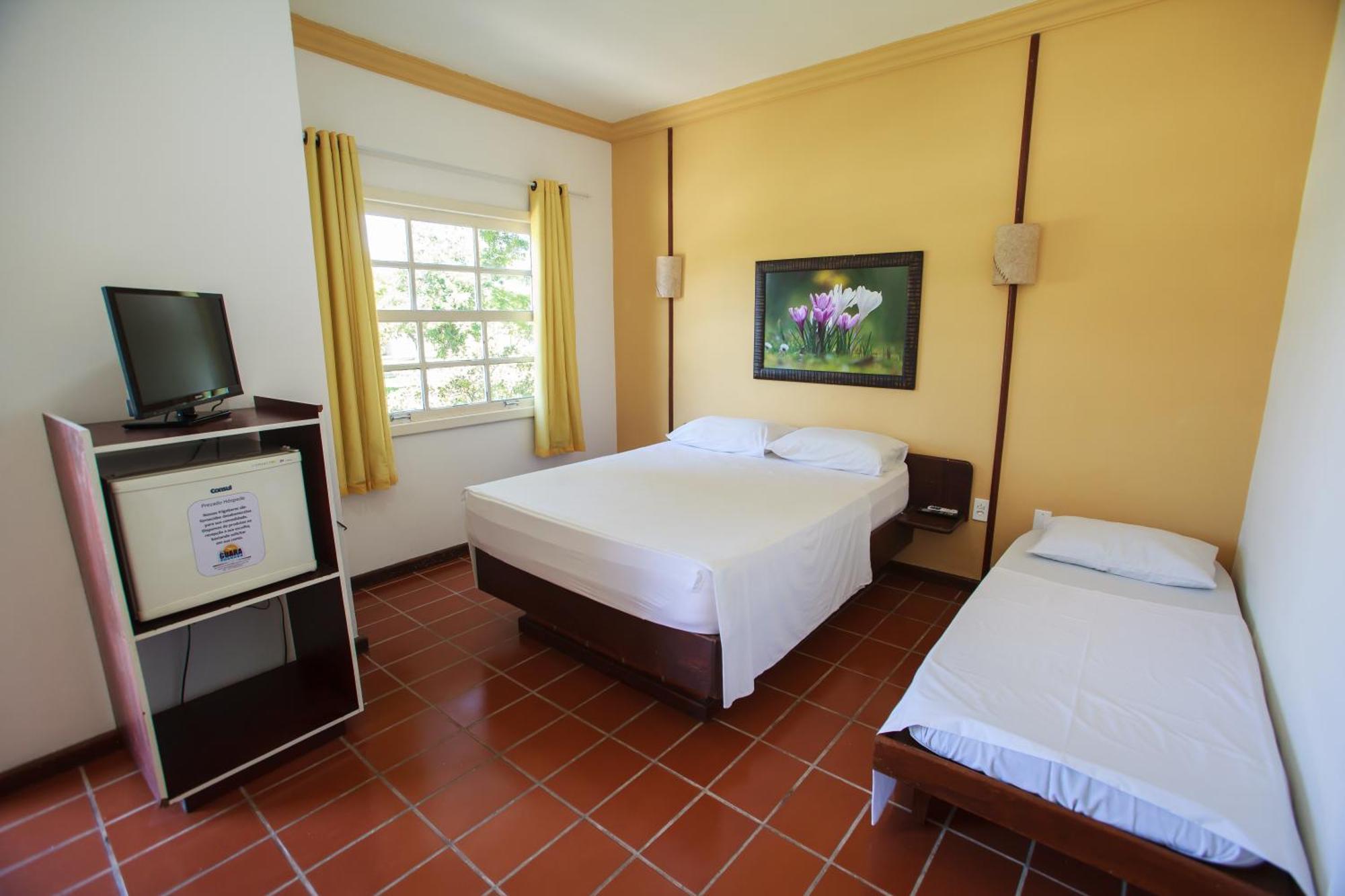 Quarto Triplo Clássico com Vista do Jardim