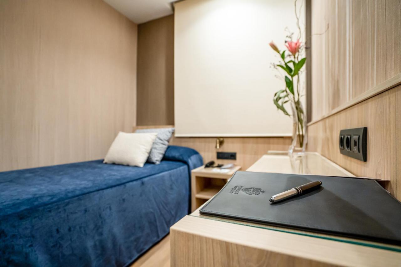 Quarto Individual com Casa de Banho
