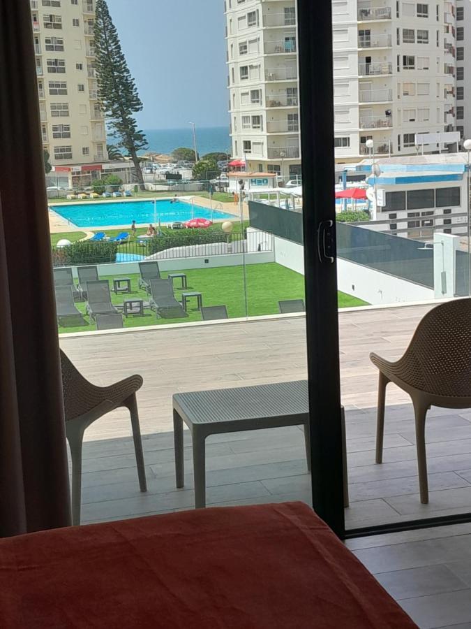 Quarto Triplo com Vista Piscina