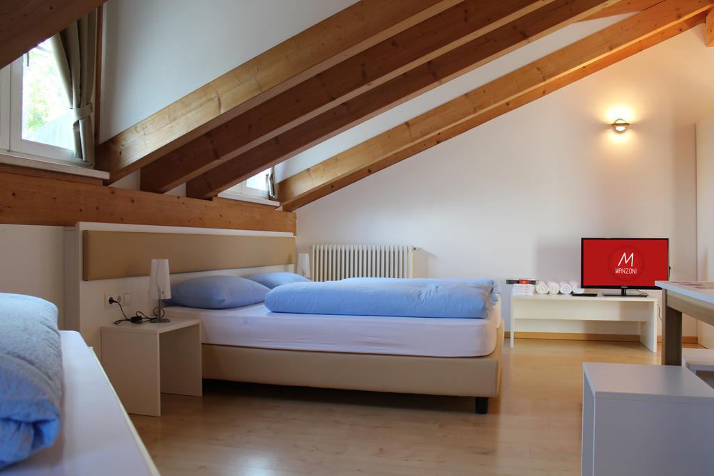 Camera Quadrupla con Bagno in Comune