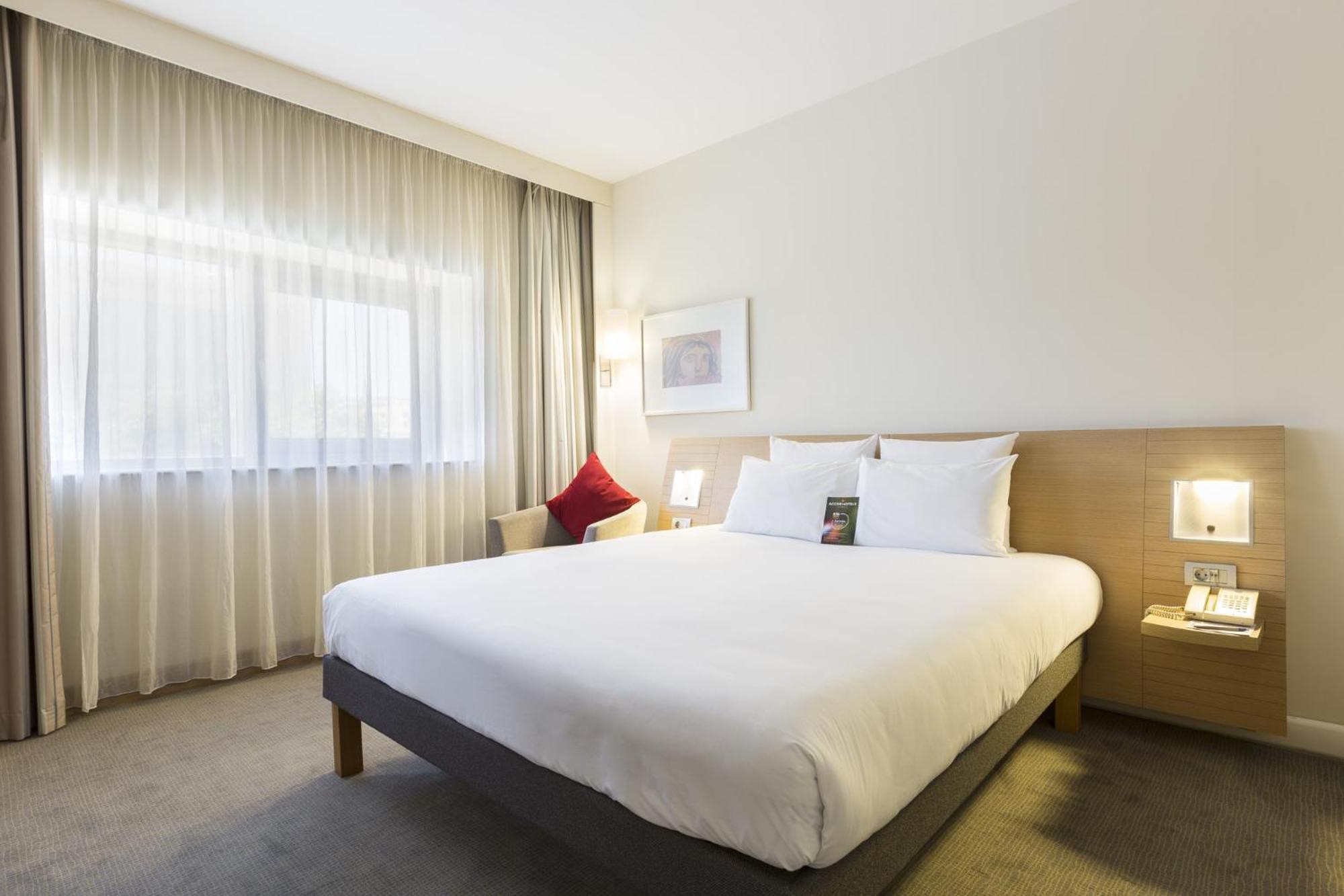 Executive Kamer met Queensize Bed en Slaapbank