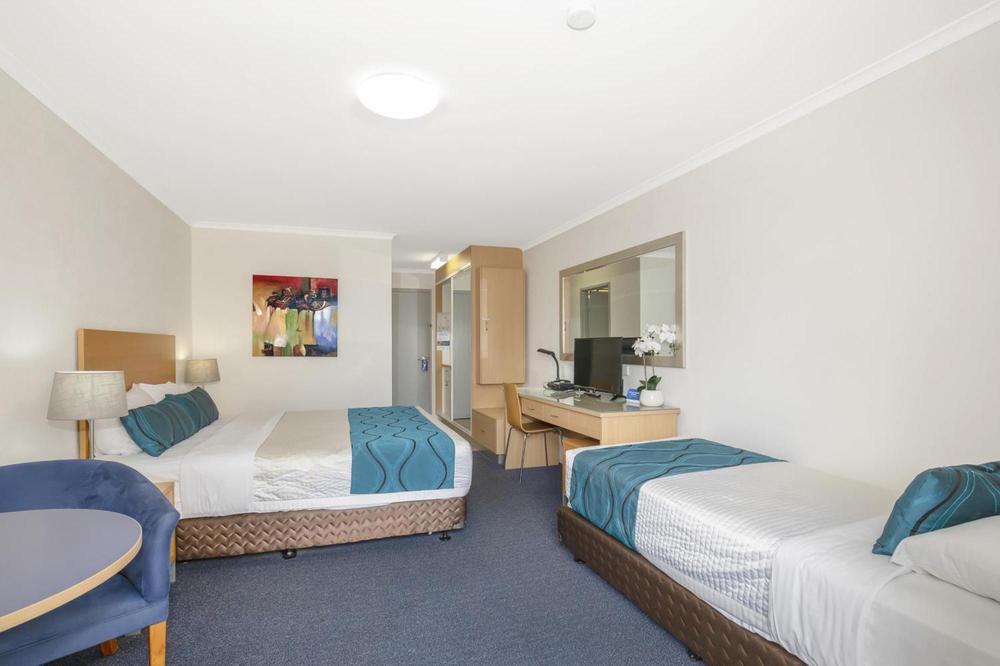 Deluxe Zimmer mit Kingsize-Bett und Einzelzimmer