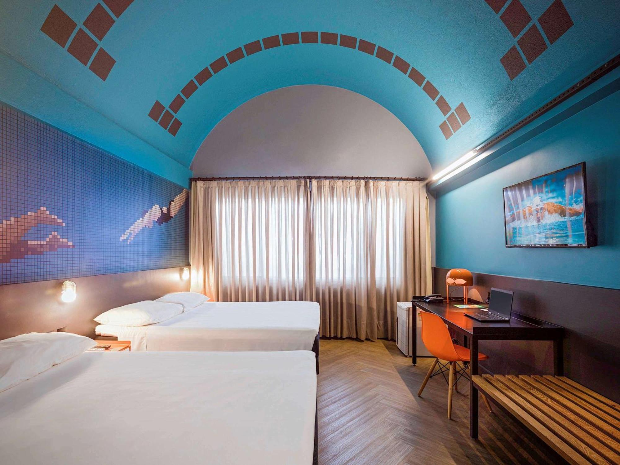 Quarto Duplo Superior com 2 Camas de Casal