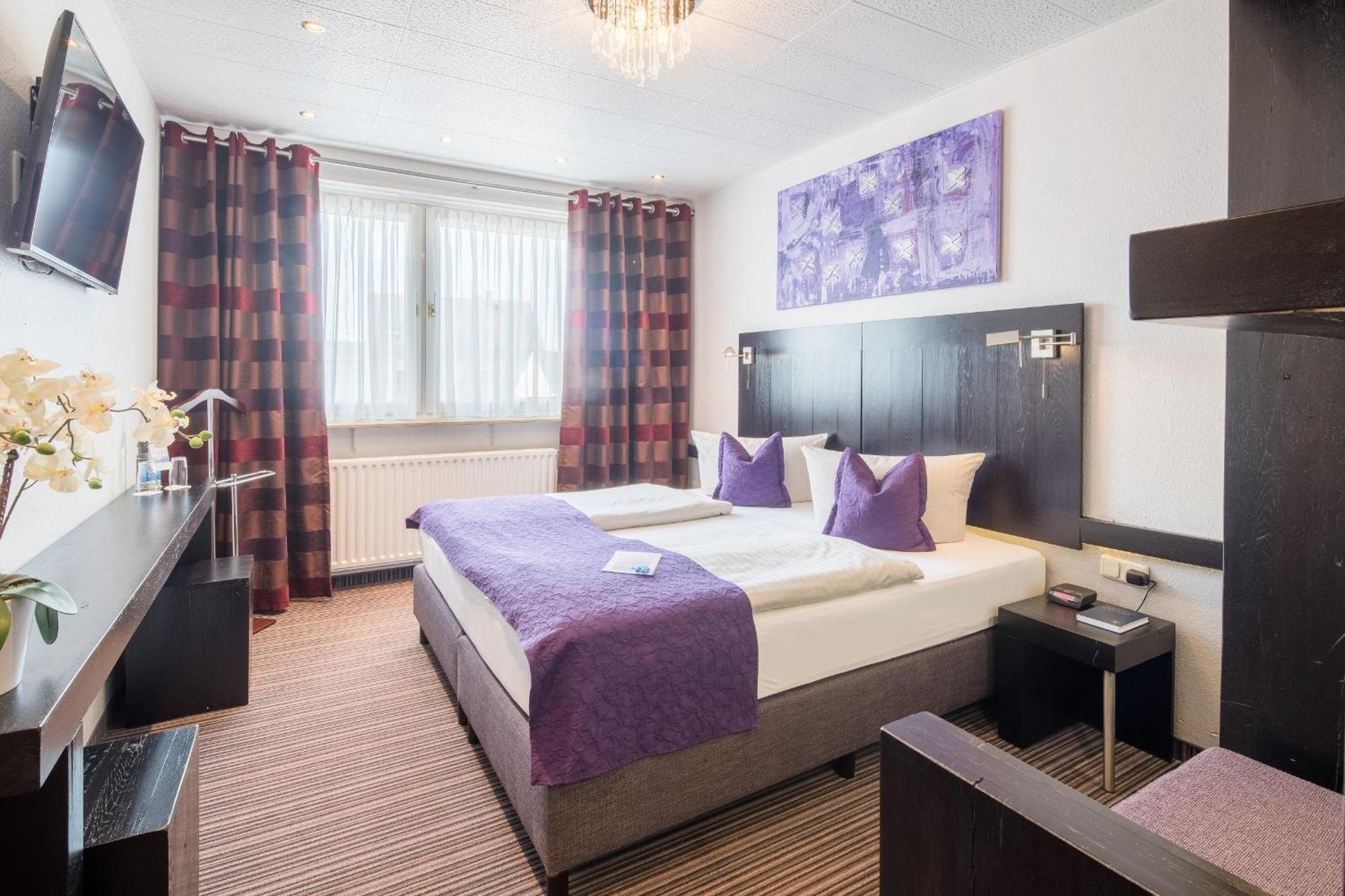 Comfort Zimmer mit Kingsize-Bett