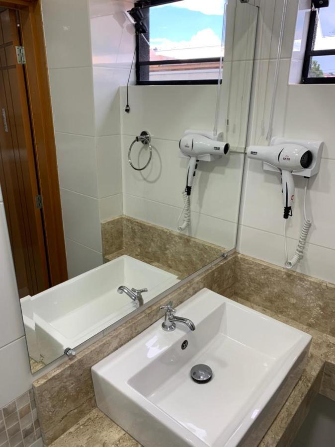 Quarto Triplo Executivo