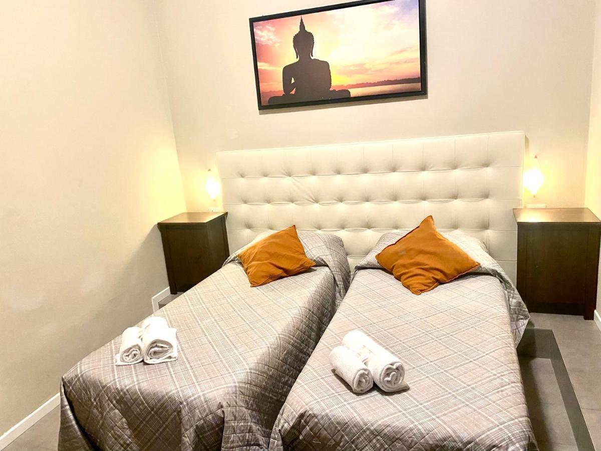 Quarto com 2 Camas de Solteiro