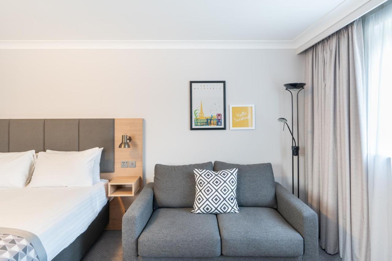 Premium Kamer met 1 Queensize Bed - Slaapbank