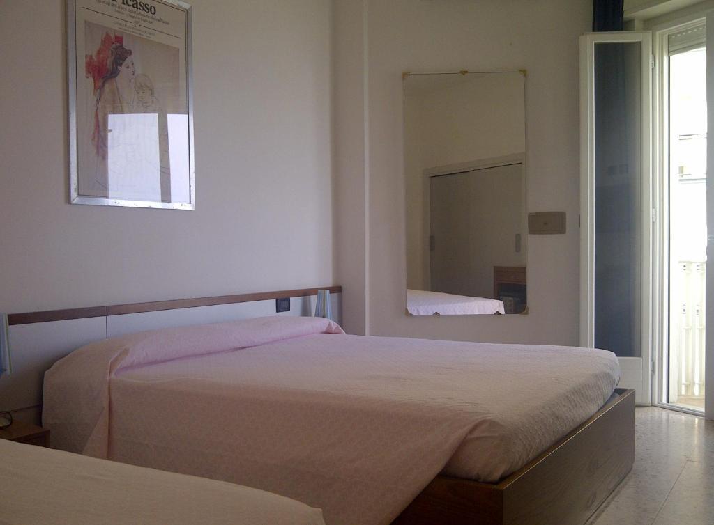 Dreibettzimmer mit Meerblick und Zugang zum Strand
