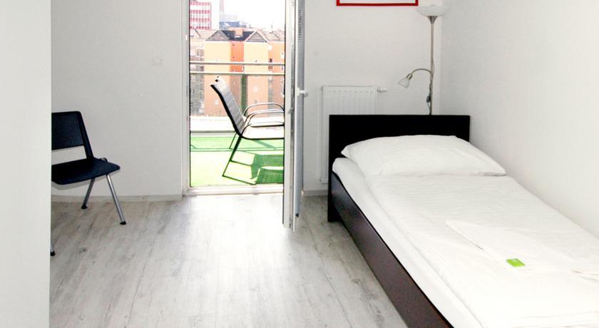 Standard room with windows facing a noisy street
