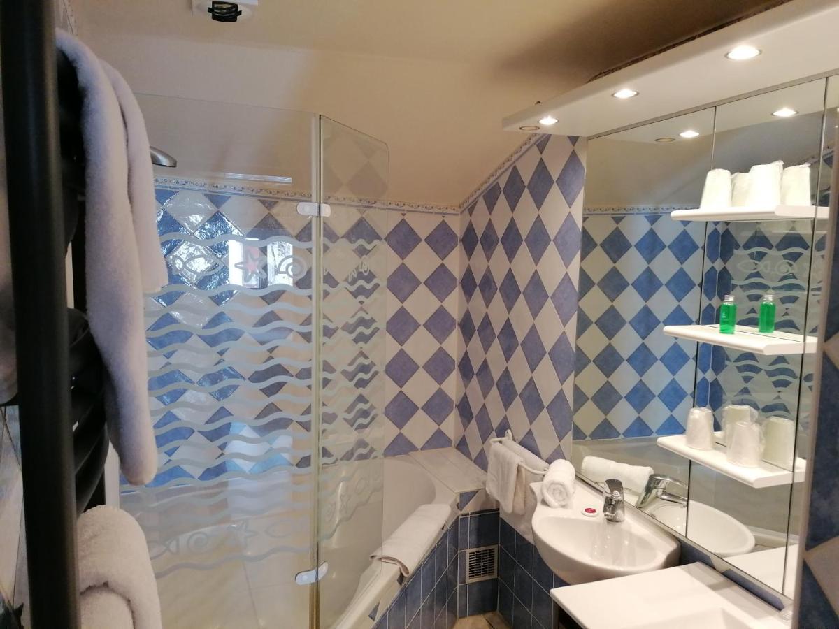 Chambre Quadruple avec Baignoire