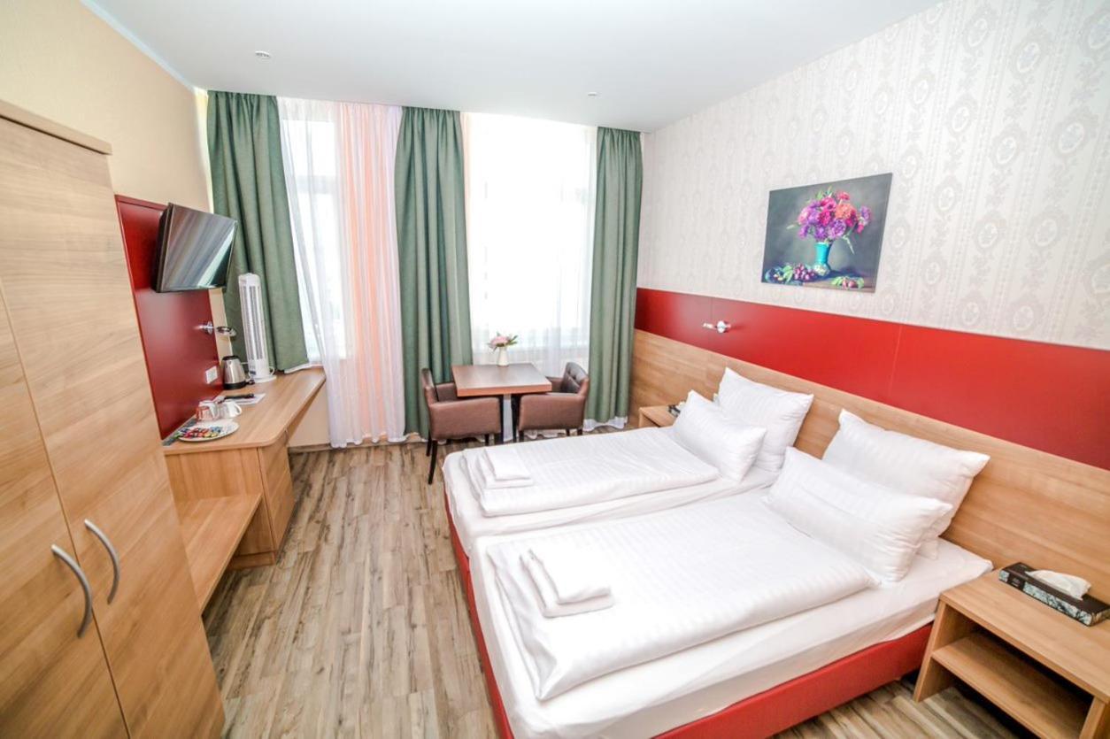 Doppel- oder Zweibettzimmer