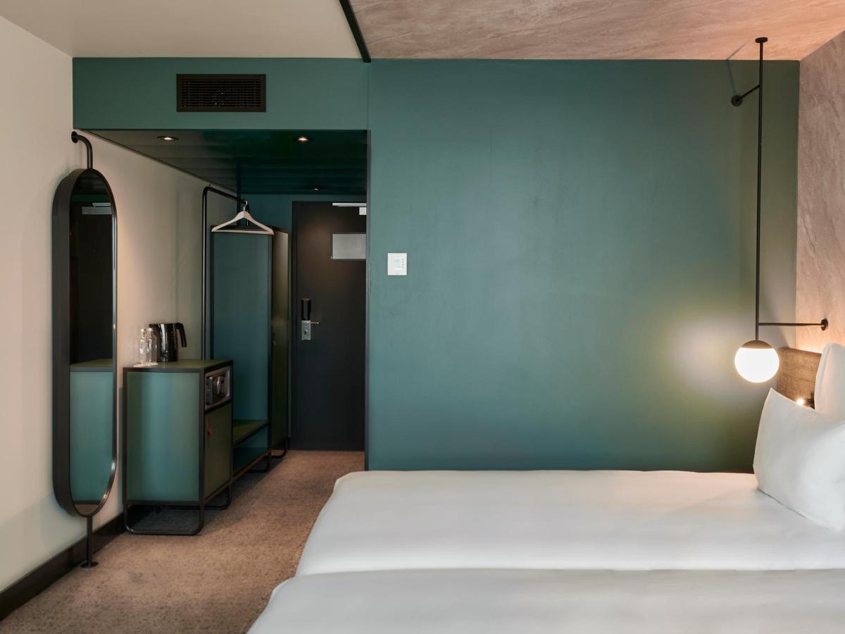 Habitación Doble Superior con 2 camas individuales y sofá cama