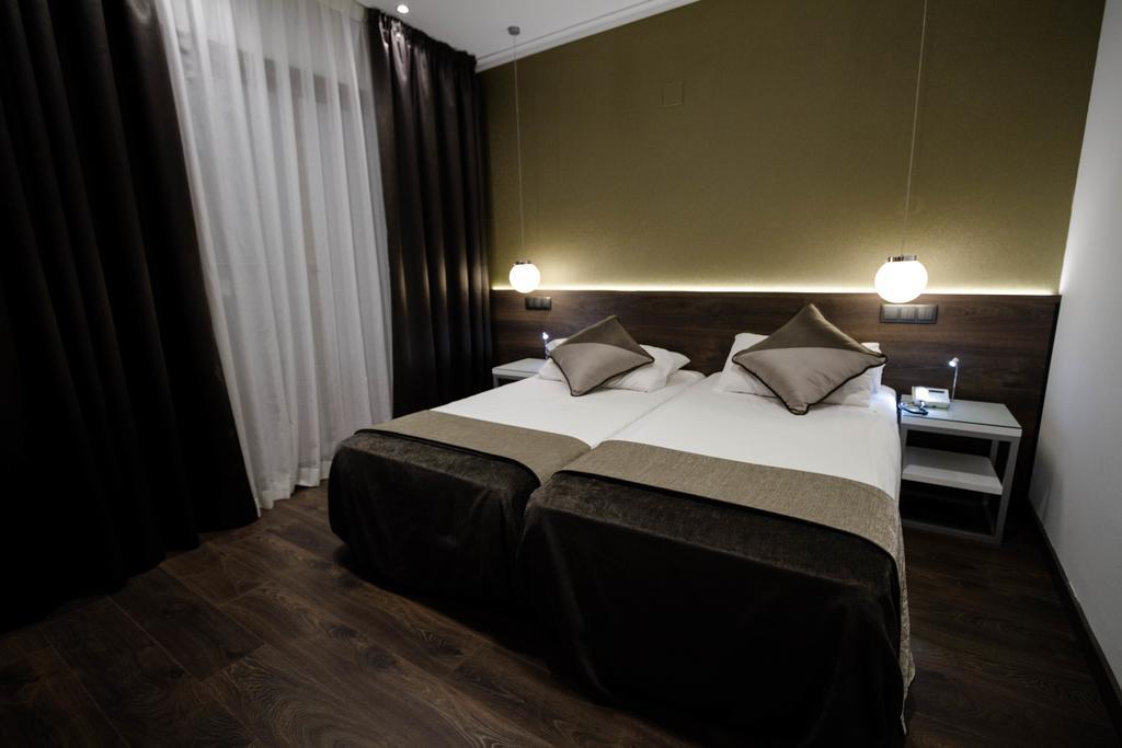 Tweepersoonskamer met 2 Aparte Bedden