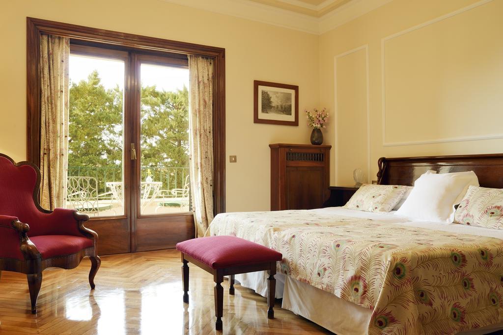 Habitación Triple Clásica con terraza y acceso al spa