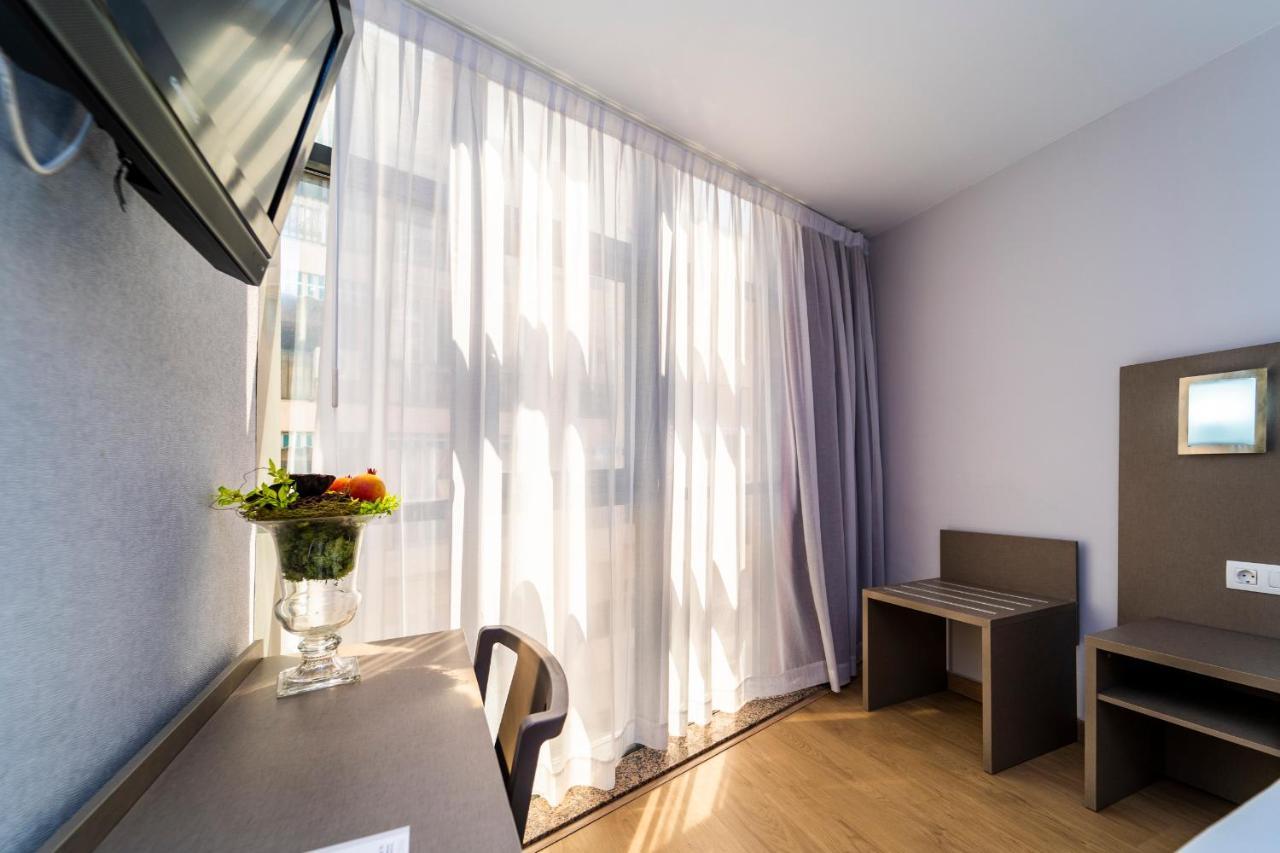 Quarto Duplo ou Twin com Vista da Cidade