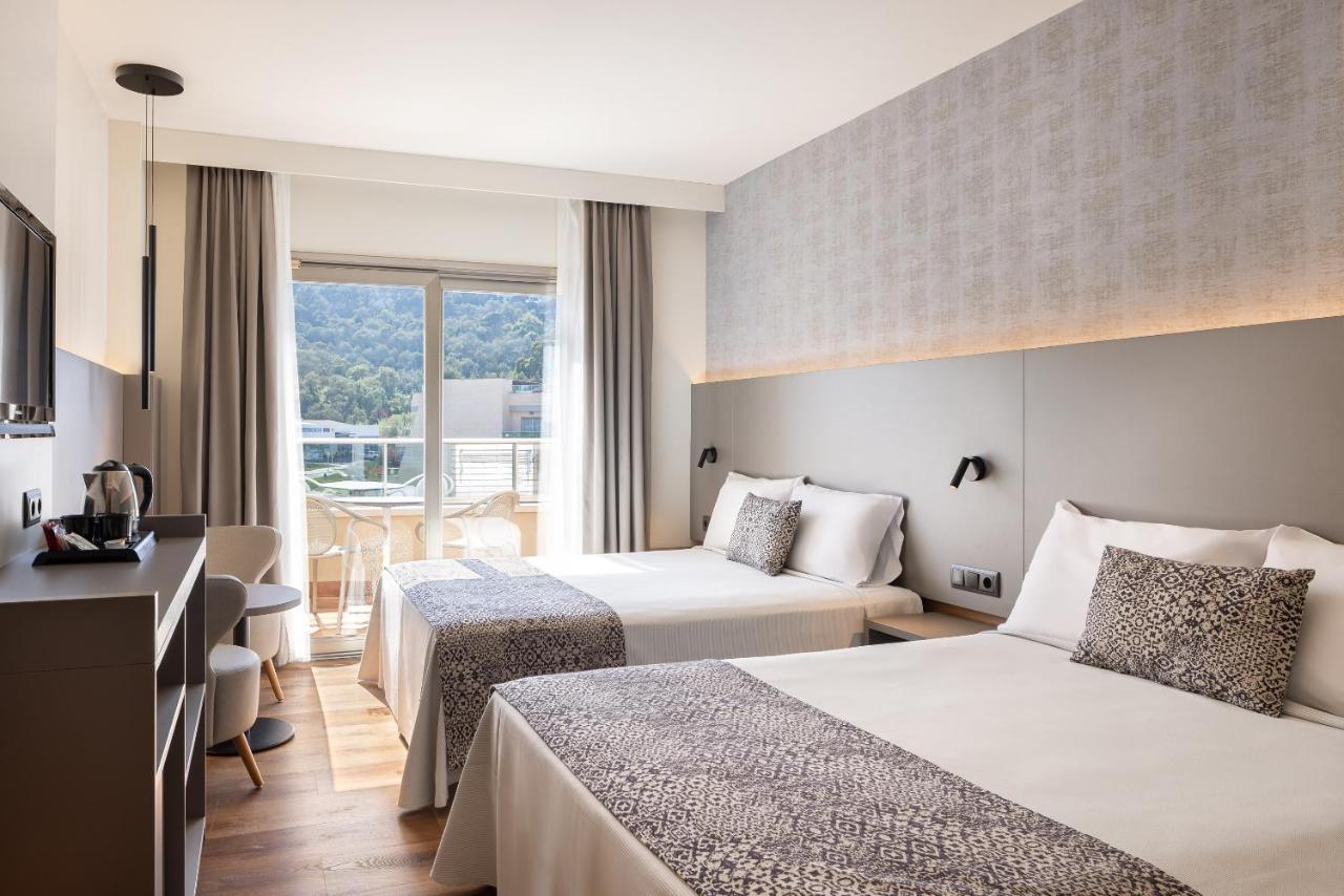 Habitación Cuádruple (2 adultos + 2 niños)