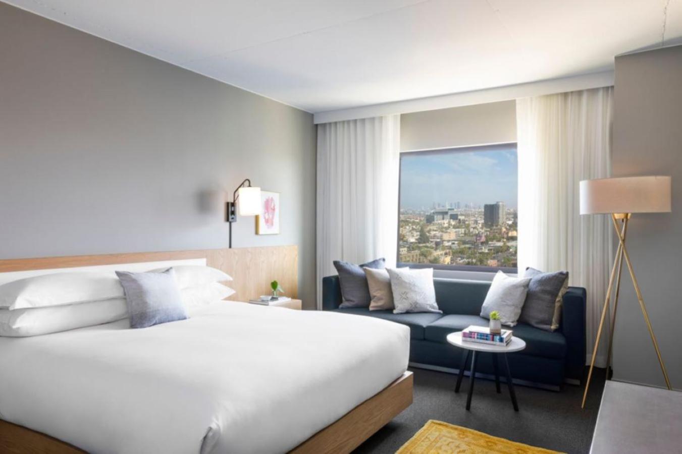 Kamer met Kingsize Bed en Uitzicht op de Stad