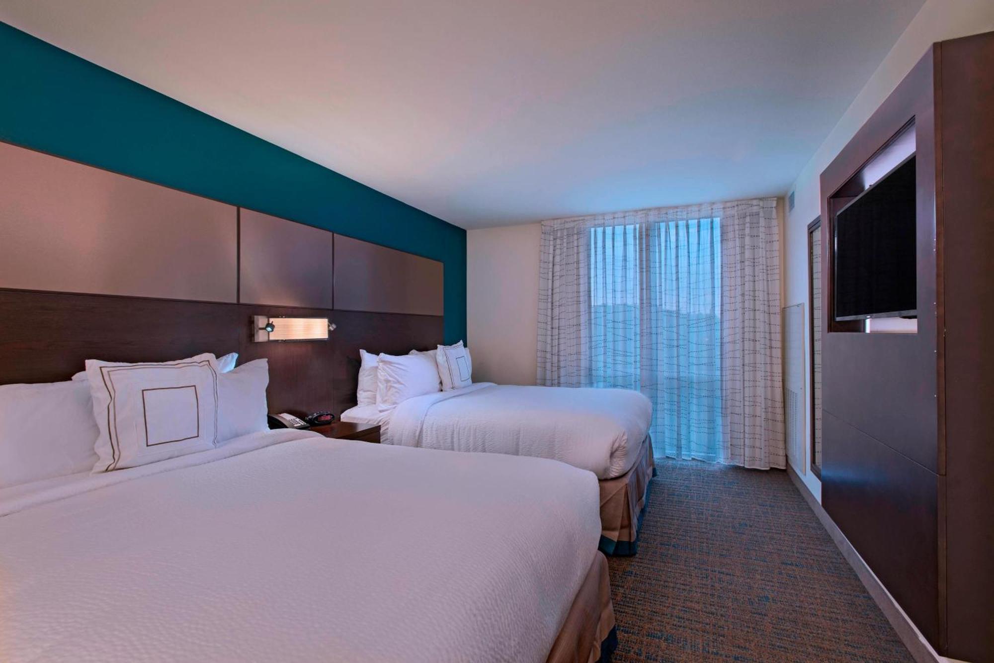 Queen Suite with Two Queen Beds and Sofa Bed
