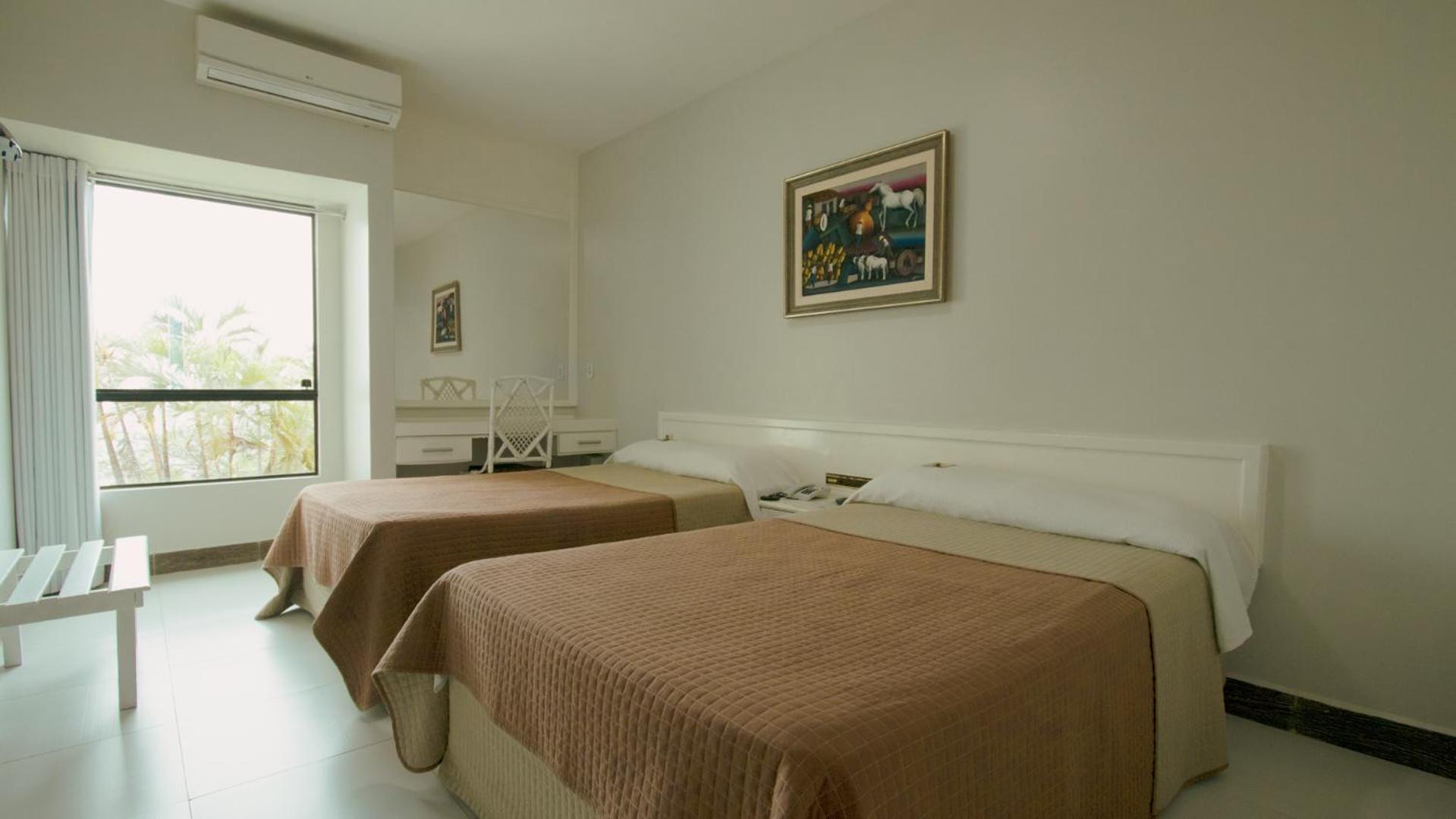 Quarto Deluxe com Cama de Casal ou 2 de Solteiro