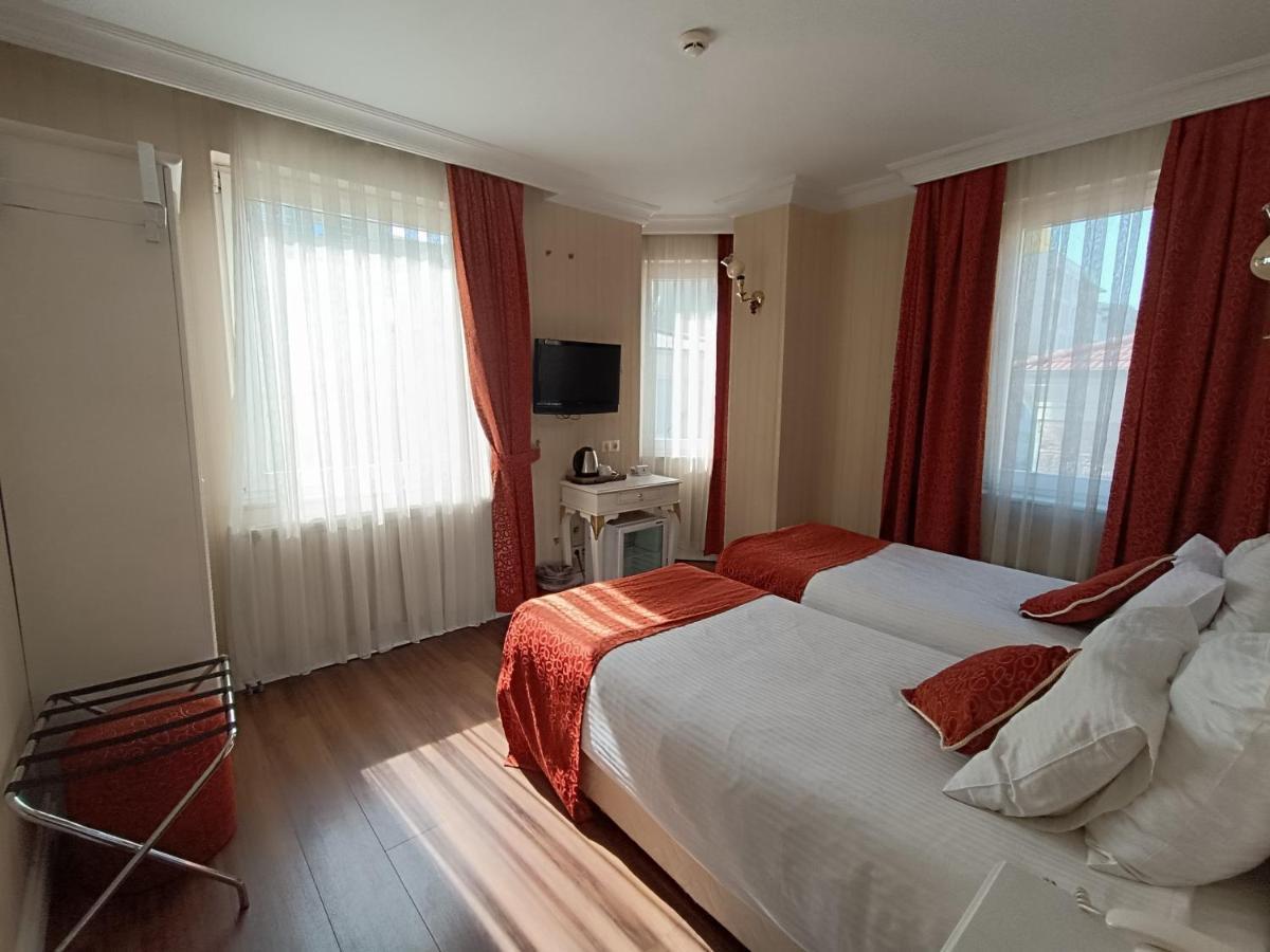 Tweepersoonskamer met 1 of 2 Bedden en een Extra Bed