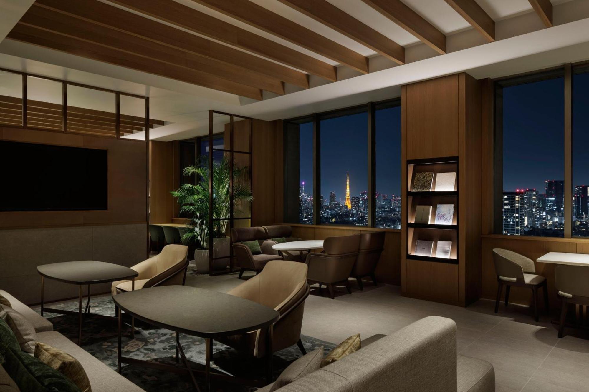 Habitación con cama extragrande y acceso al salón Club Lounge - Planta superior
