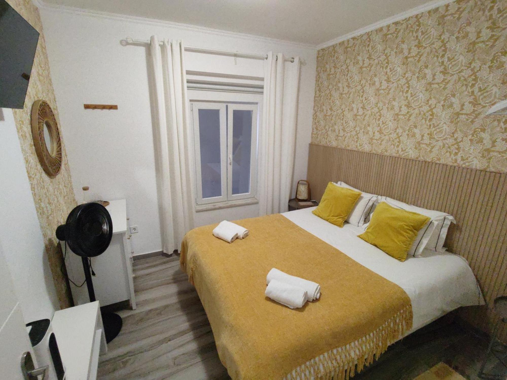 Quarto Duplo ou Twin com Casa de Banho Partilhada